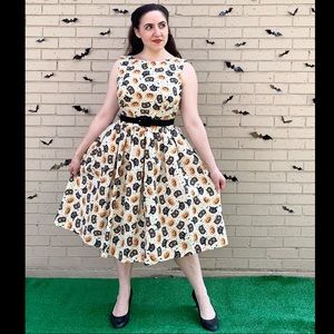 Handmade dress in vintage-inspired Halloween novelty print.